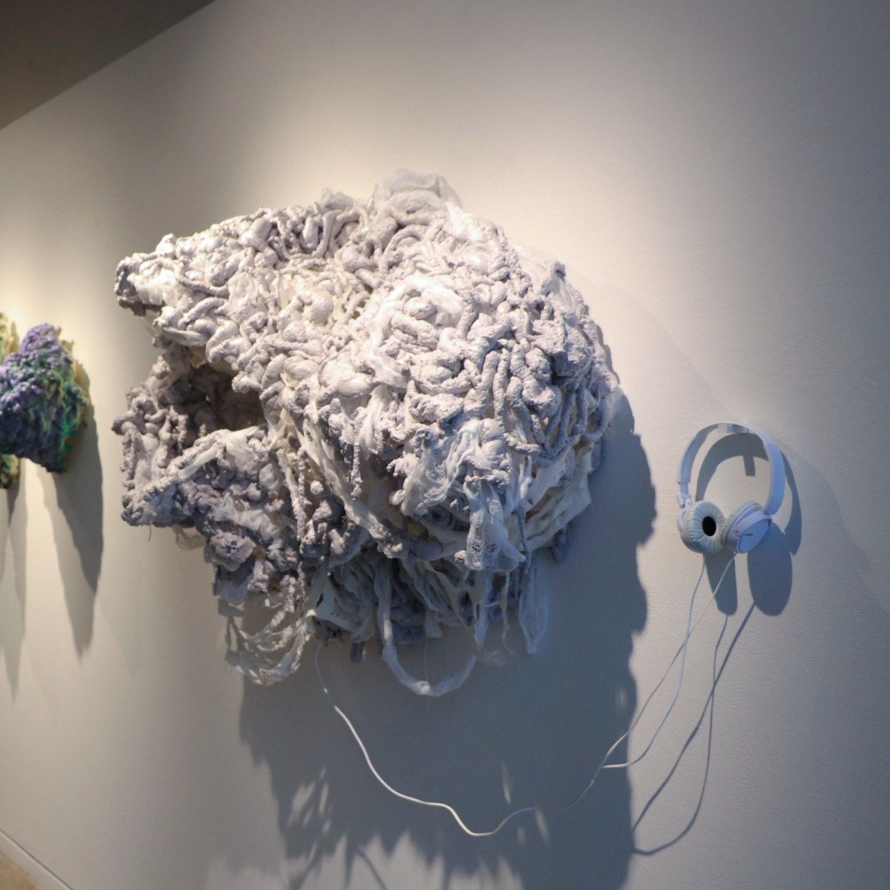 Natalie Lorenz's Permanent Ricochet, Senior Capstone. Wall sculpture.