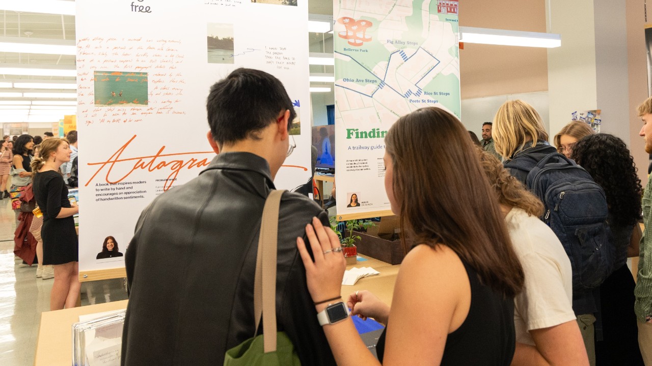 Guests viewing the Communication Design senior capstones at DAAPworks '24.