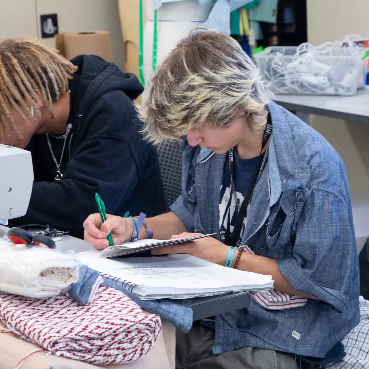 Fashion studies DAAPcamp student working on a project.