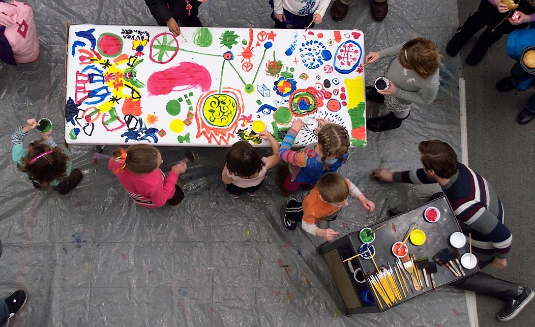 children working together to make art