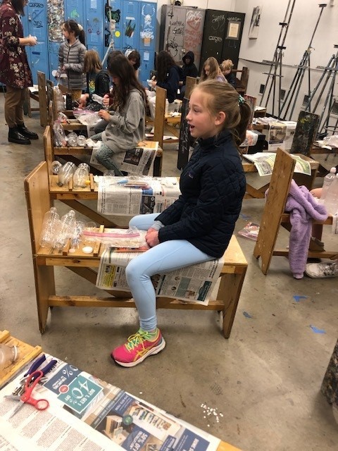 Saturday Art Program student preparing for class.