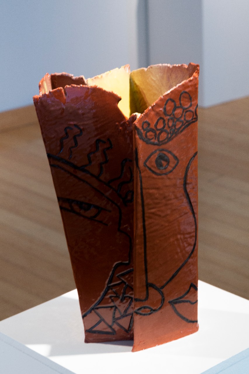 tall rectangular geometric earthenware vessel