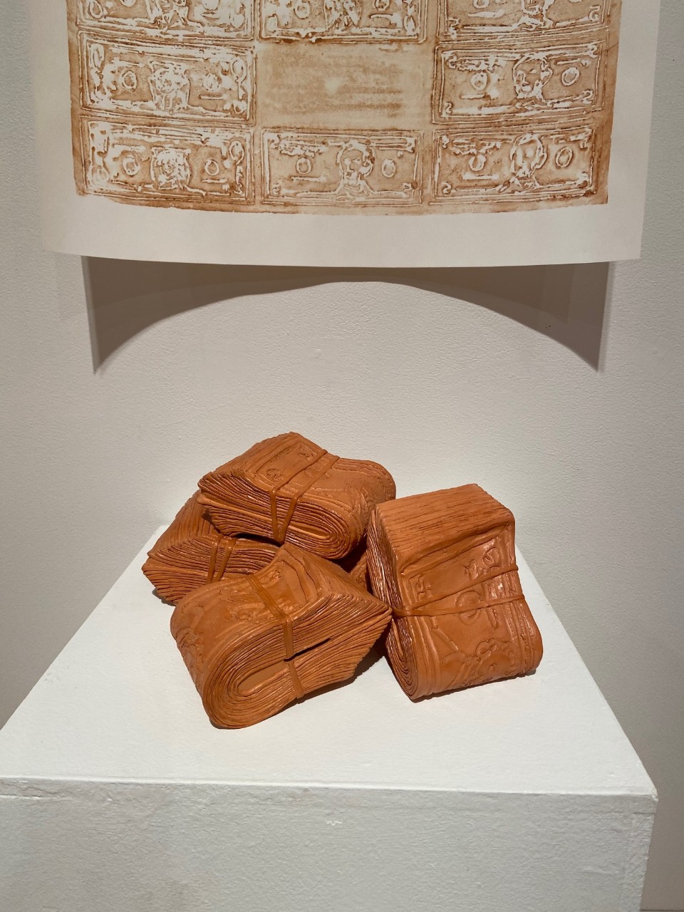 terra cotta and paste wax money