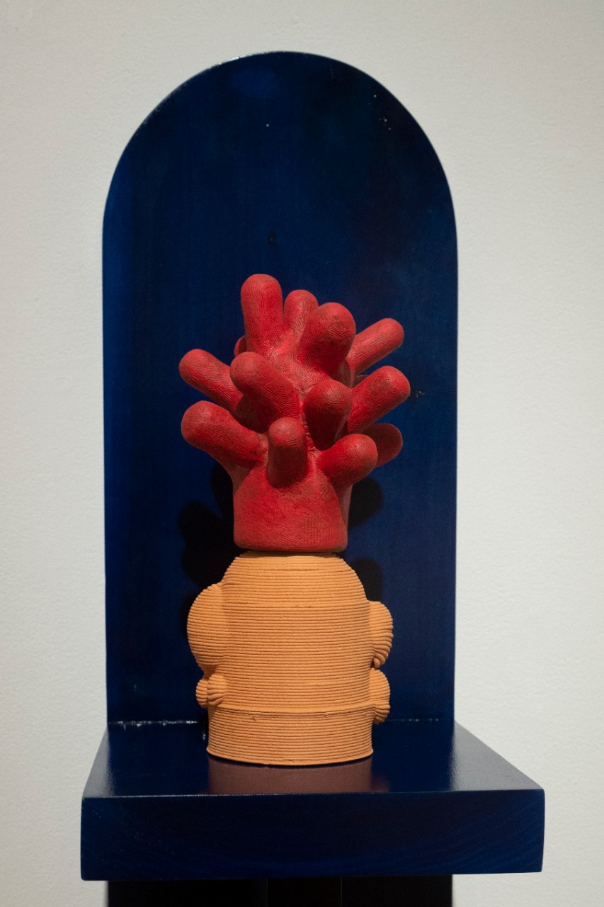 red 3D-printed and stoneware cacti