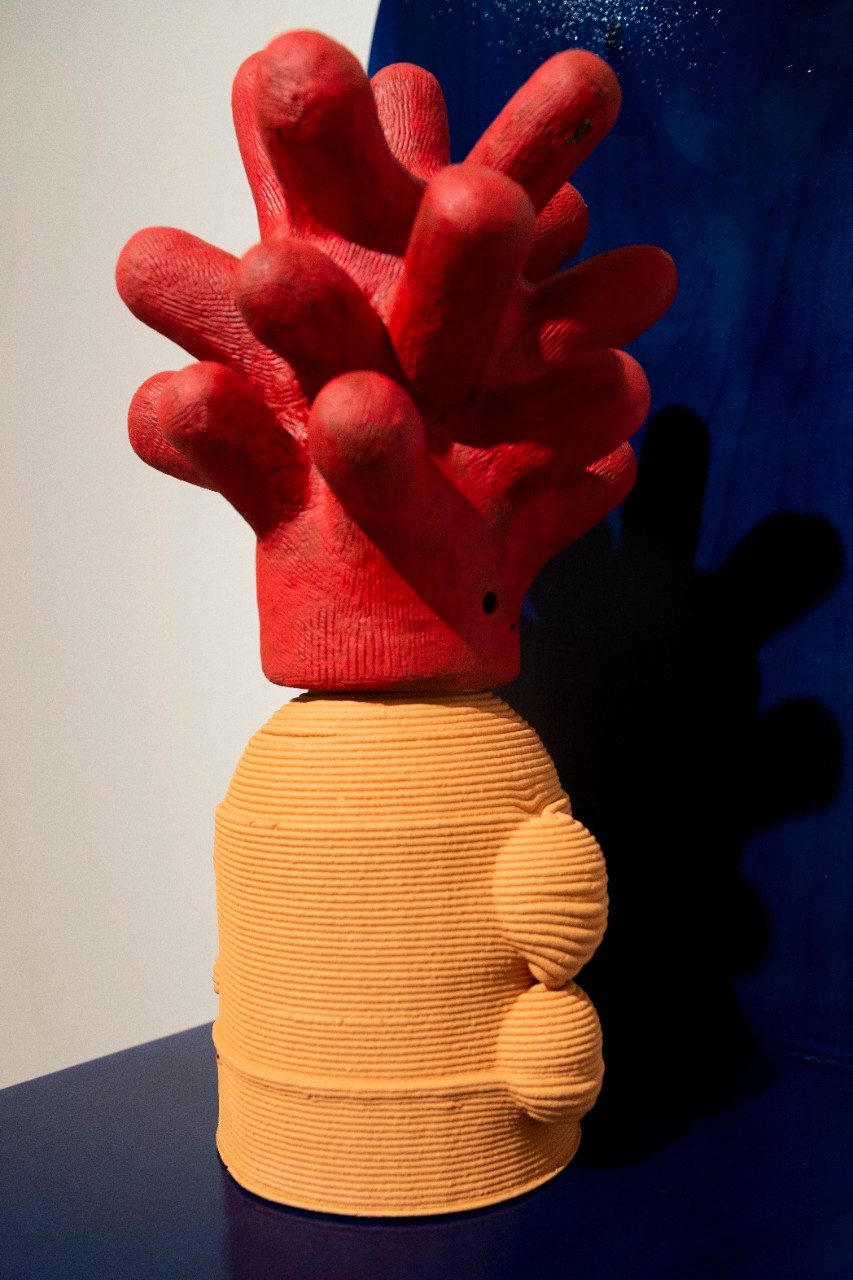 red 3D-printed and stoneware cacti