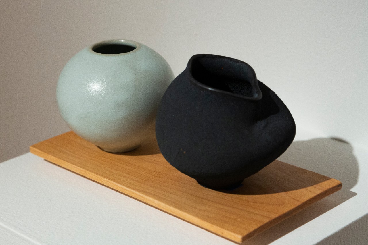 teal and black ceramic bowls