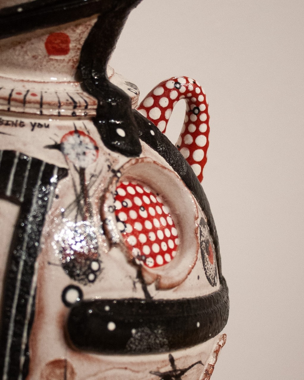 urn with black and red detail