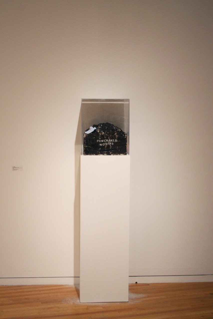 ceramic artwork under vitrine