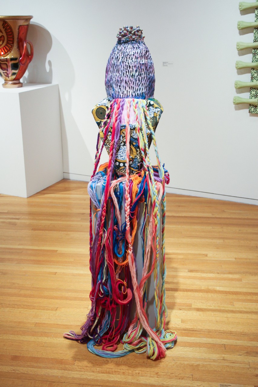 ceramic sculpture with yarn