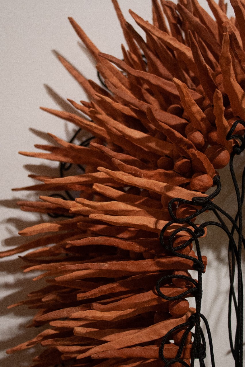 spiked detail of kye cottier's work