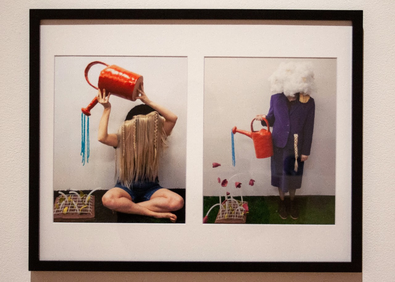 photo of figure with watering can