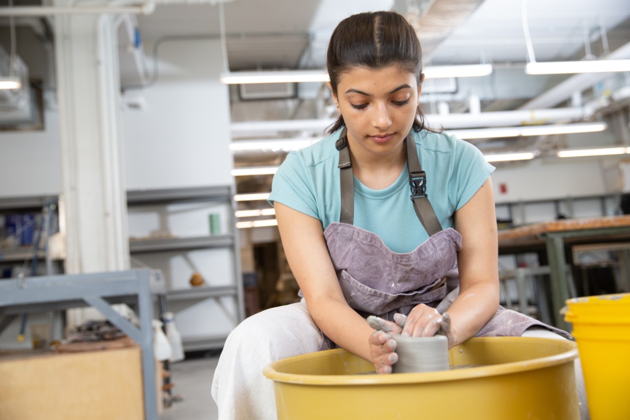 DAAP students working in various studios. Ceramics