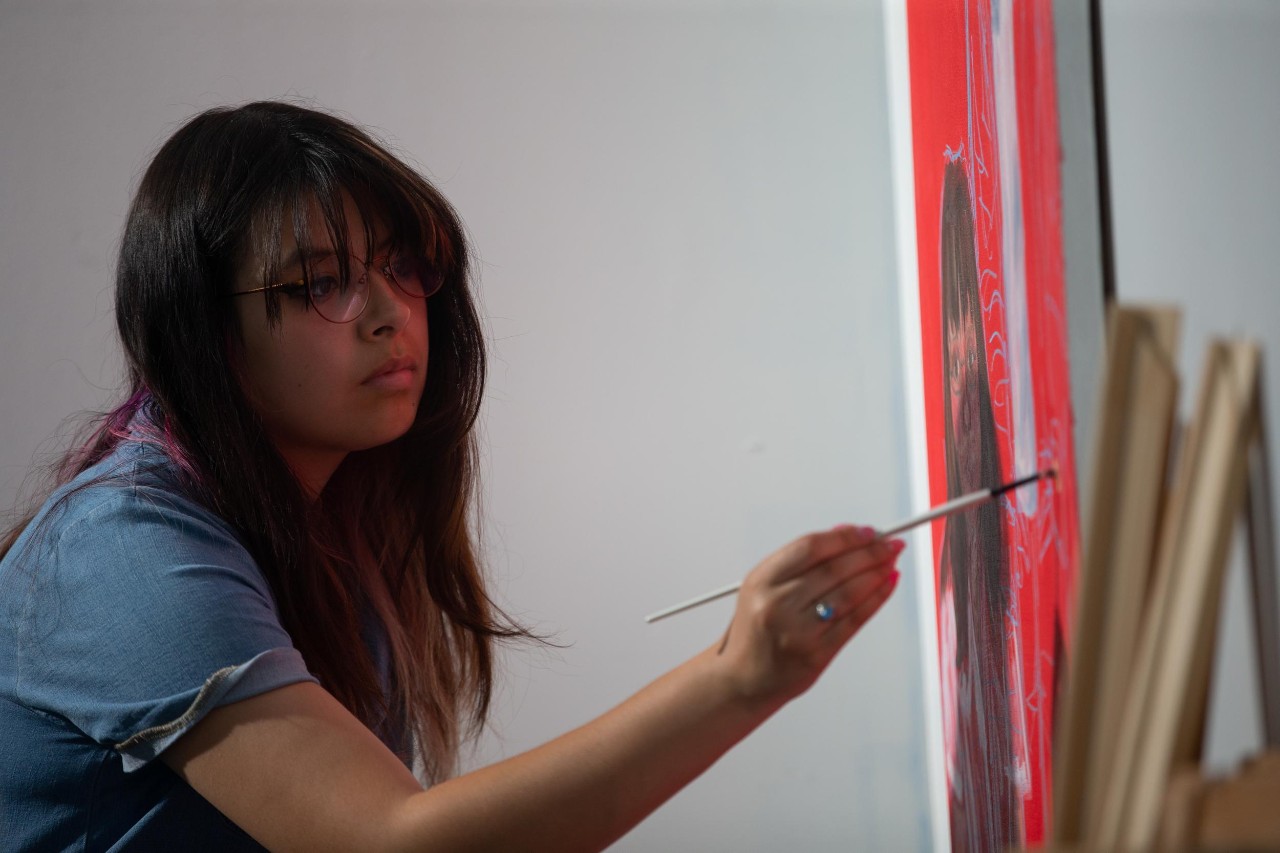 Filming an institutional spot/PSA. Fine Arts scene.